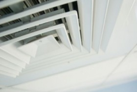 air condition vent in office ceiling close up
